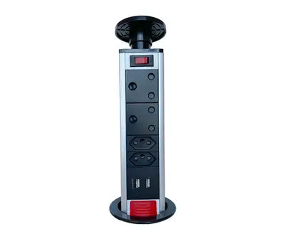 A black pop-up USB charging port with a plastic top cover, featuring multiple socket outlets.